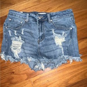Almost famous size 11 denim distressed shorts.